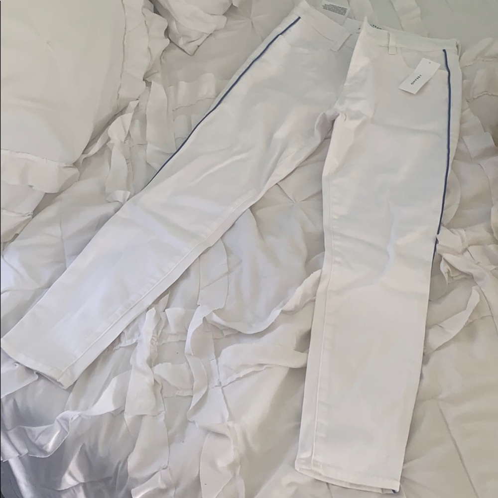White crop jeans with blue stripe down sides